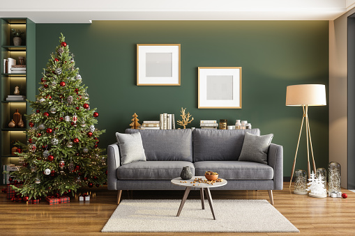 Modern Living Room Interior With Christmas Tree, Ornaments, Gift Boxes And Picture Frames