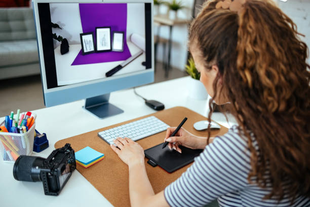 istock Female photographer edits her photos 1652328062