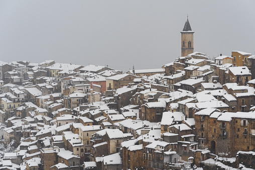 Winter view of Pacentro medieval town with the bell tower under heavy snowfall, Apennines, Majella National Park, L'Aquila province, Abruzzo, Italy, Europe