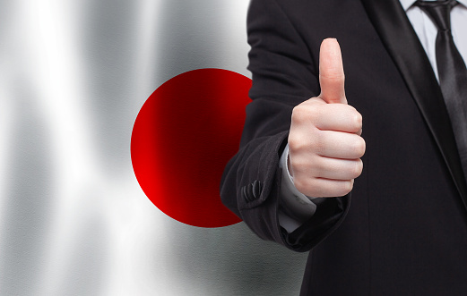 American and South Korean flag standing on the table with defocused background