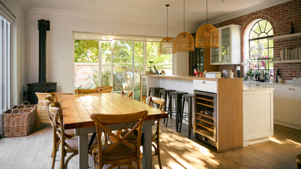 istock Interior Of Modern Home With Kitchen Area Counter With Dining Table 1652377680