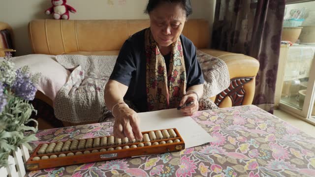 Elderly people in Asia use abacus calculations