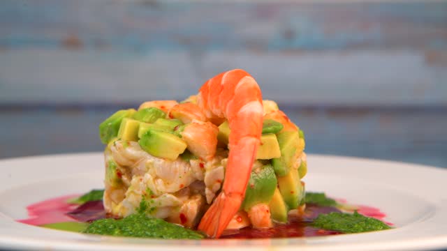 RECIPE FOR CEVICHE OF BREATHER, SHRIMP, AVOCADO, LIME, PARSLEY SAUCE, OLIVE OIL AND LEMON ON A BED OF BEET