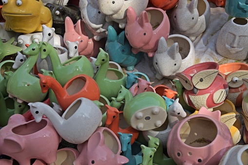 Group of clay piggy bank pigs.