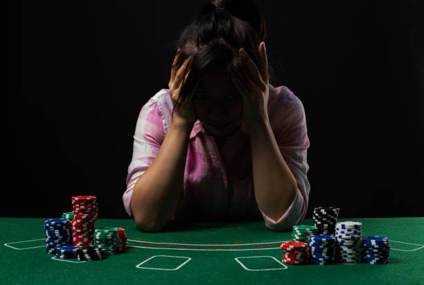 istock Sad woman sitting in casino 1652461502