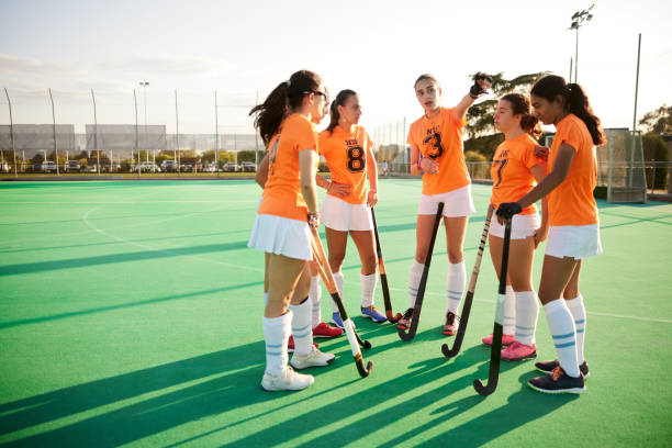 istock Captain's Command: Teammates Form a Circle, Eagerly Listening to Pre-Game Instructions. 1652491344