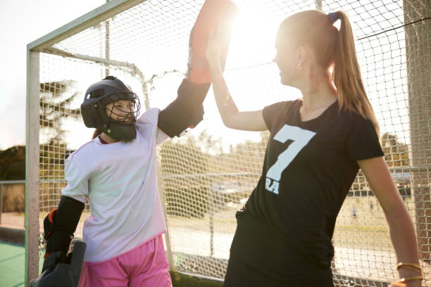 istock Celebrating a Challenge: Defender and Goalkeeper Rejoice After a Difficult Save 1652491970