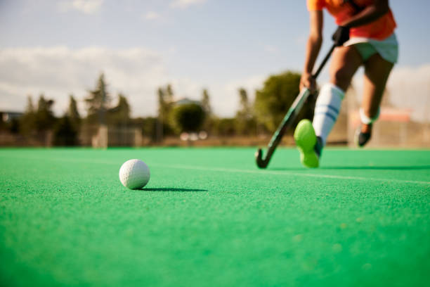 istock Dynamic Field Hockey Scene: Ball in Sharp Focus. 1652492548