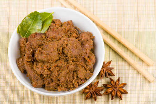 Malaysian/Indonesian spicy dry beef stew with coconut milk and spices.