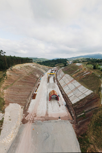 A highway under construction, including an artificial tunnel, as seen from above
