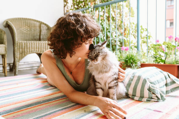 istock Yoga on balcony with pet cat 1652517005