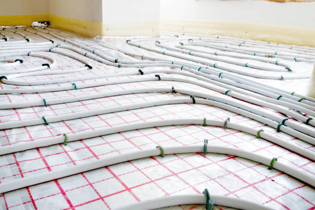 istock Installation of underfloor heating pipes for water heating. Heating systems. Pipes for underfloor heating. 1652518146