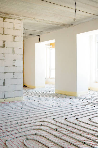 istock Installation of underfloor heating pipes for water heating. Heating systems. Pipes for underfloor heating. 1652518173