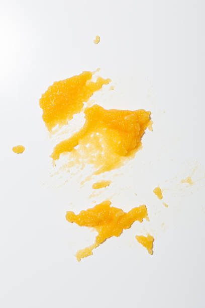 istock yellow cosmetic smugde swatch on light surface  peeling scrub 1652521006
