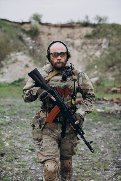 istock Armed Ukrainian soldier practicing his fighting skills and looking  in the camera 1652522107