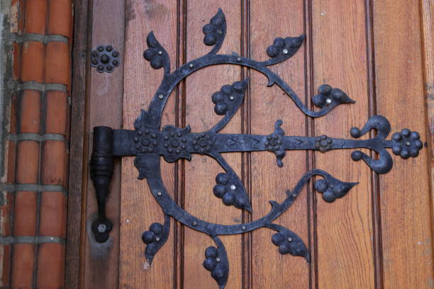 istock Decorative hinge on a wooden door 1652538344