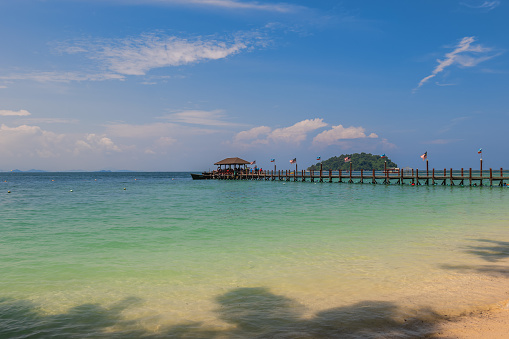 Jetty of Manukan island, an island of Tunku Abdul Rahman National Park in Sabah, Malaysia