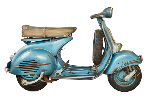 Side view of a vintage blue Italian scooter from the fifties