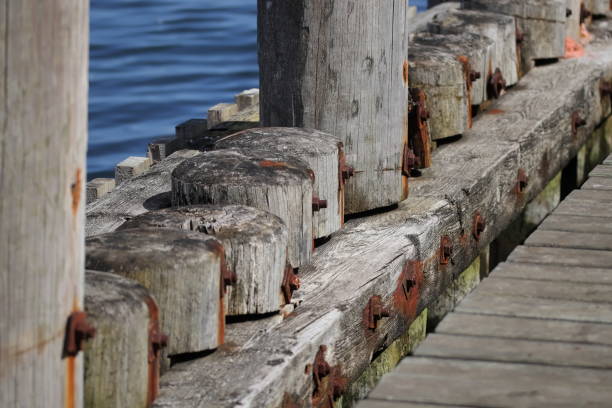 istock Wooden bridge and rusty screws 1652556694