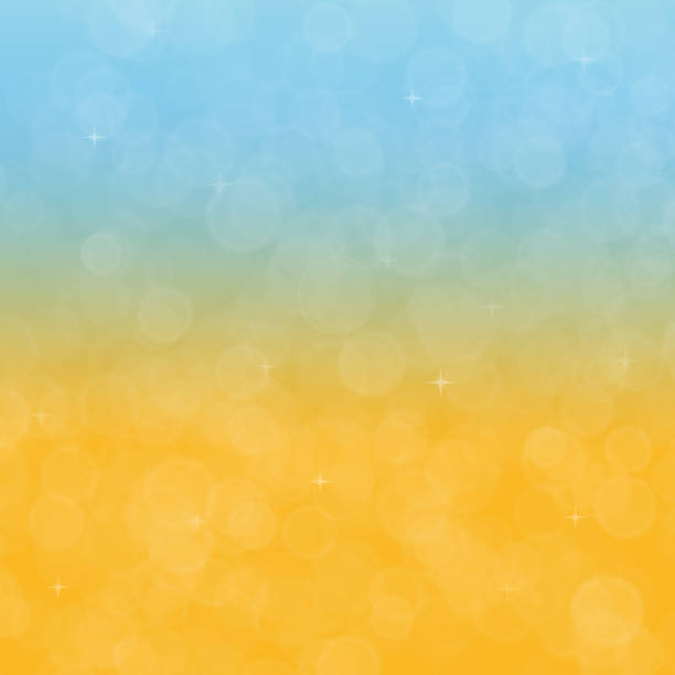 istock Blue and yellow bokeh background with natural glitter and bubbles 1652563796