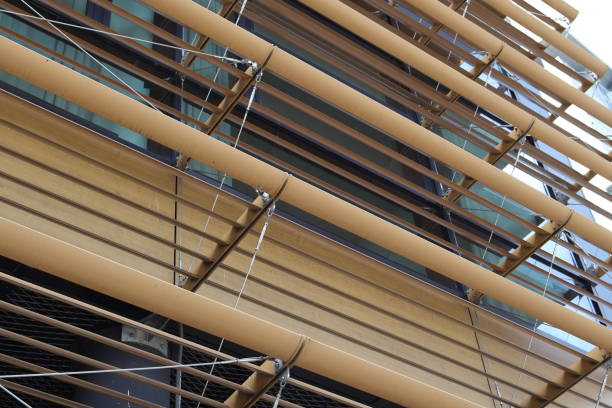 istock Beige lines on a glass skyscraper 1652563808