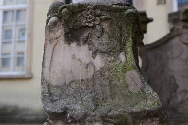 istock An old damaged bas-relief on a plinth 1652568431