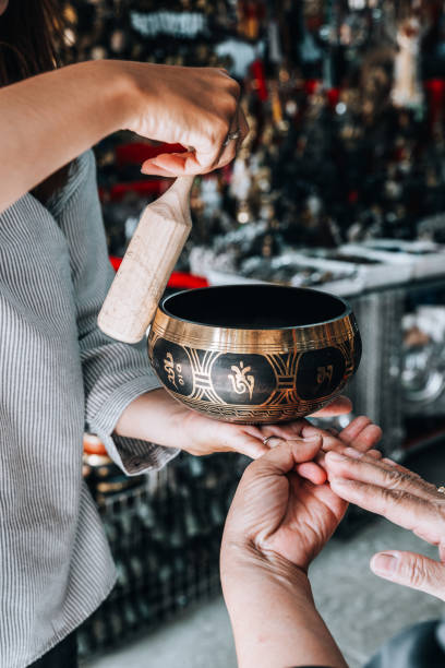 istock Learning how to play a singing bowl in Thailand 1652598408