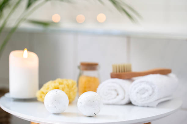istock Bathroom with tropical plants bath rolled towels 1652611027