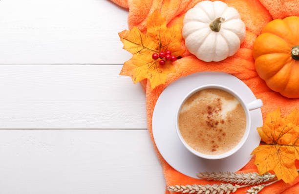 istock Autumn background with leafs cup of coffee 1652612145