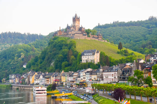 Cochem, Germany - May 19 2018: Cochem Castle, Reichsburg Cochem, and town, daytime view.