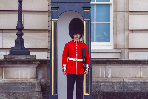 London, UK - September 8 2022: A King's Guard stands outside Buckingham Palace.
