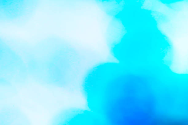 istock fresh texture with pale overlapping bright polka dots from white to blue. 1652658888