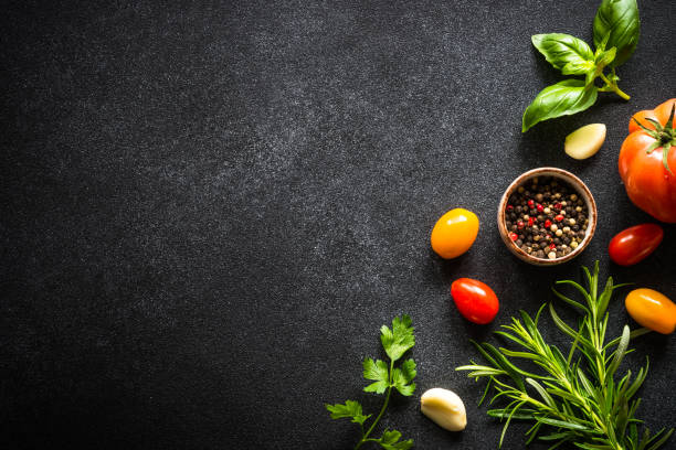 istock Food cooking background on black. 1652669670