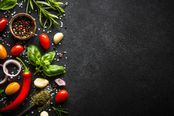 istock Food cooking background on black. 1652669711