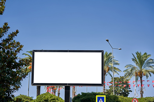 An empty billboard for outdoor advertising in the city.