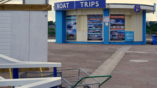 Torquay, Devon, England, UK July 03 2022: A boat trip centre for tourists on the edge of Torquay Marina