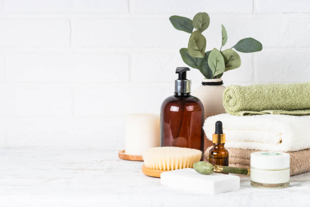 istock Stack of towels, shampoo bottle, candles, essential oil and cosmetics. 1652713438