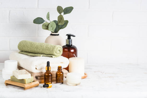 istock Stack of towels, shampoo bottle, candles, essential oil and cosmetics. 1652714498