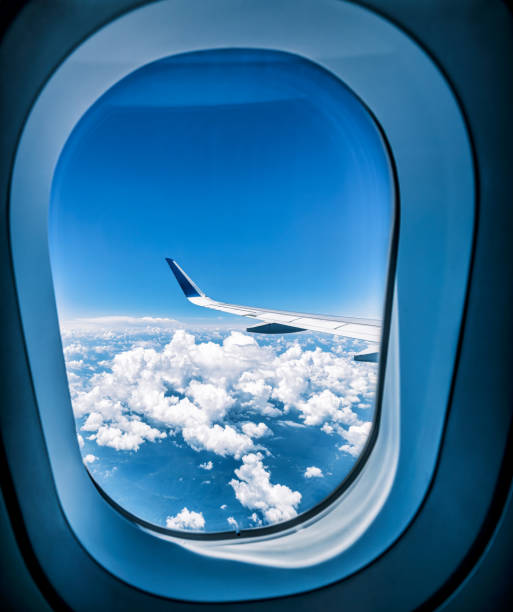 istock Aircraft wing and sky cloudscape transportation scene 1652719913