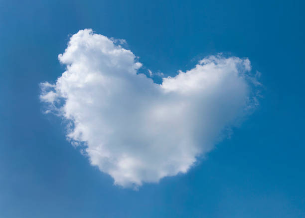 istock Heart shaped cloud against clear blue sky. 1652768675