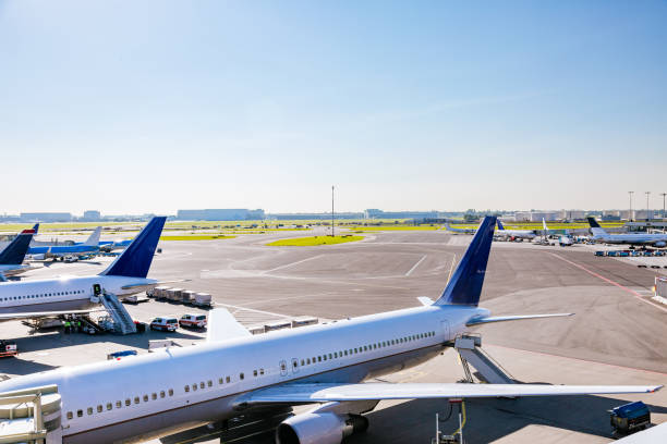 istock Multiple Airplanes Parked on Tarmac at an Airport. 1652787181