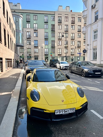 Moscow, Russia - July 30, 2023: Porsche parked on Moscow street