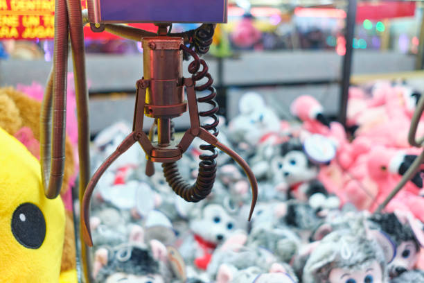 istock Fair attraction crane stuffed animals crane 1652795008