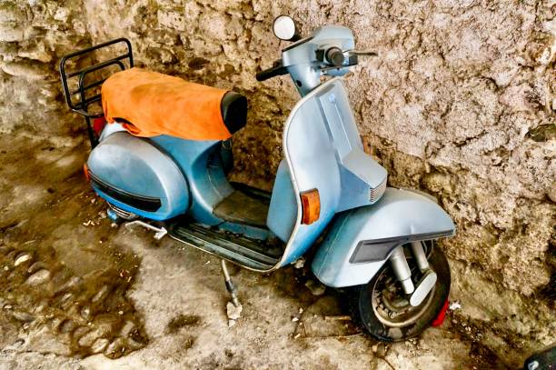 istock Classic scooter parked in an Italian medieval town. 1652799430