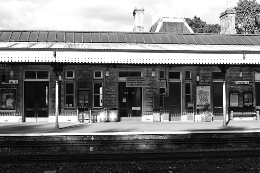Torquay, Devon, UK - August 4th 2023: Image of Torquay train station in black an