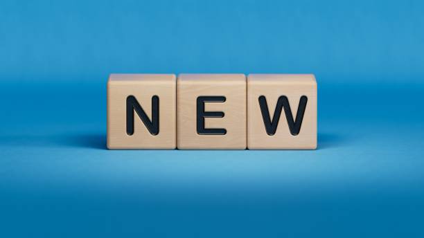 istock NEW text on wooden cubes.3D rendering on blue background. 1652804620
