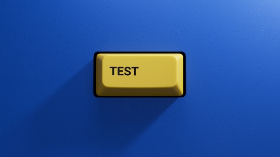 test.3D illustration of button of keyboard of a modern computer.Light yellow button.3D rendering on blue background.