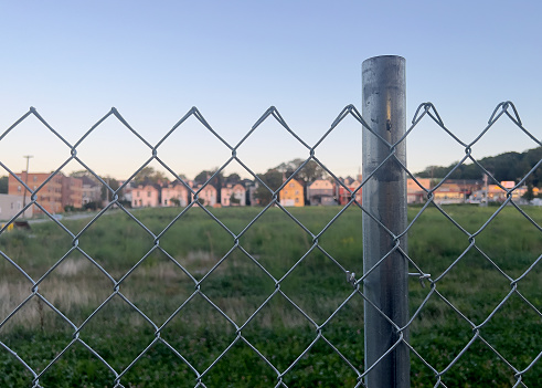 Chain link fence around vacant lot
