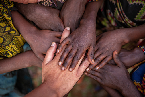 Multiracial human hands in one of African villages, Ethiopia, East Africahttp://bem.2be.pl/IS/ethiopia_380.jpg