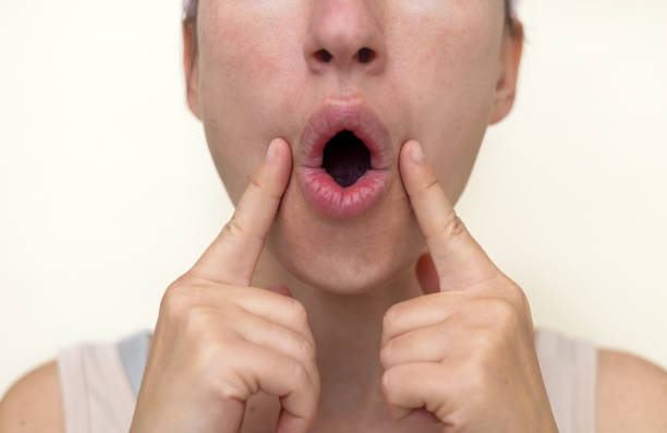 istock millennial woman practising face massage yoga exercises 1652842450